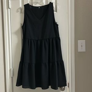 Black dress.  Small but fits like a med. kinda blousy